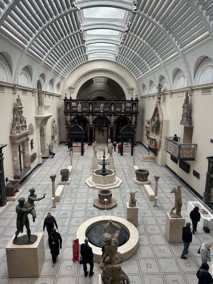 Home Elegant sculpture gallery with classical statues at the Victoria and Albert Museum.